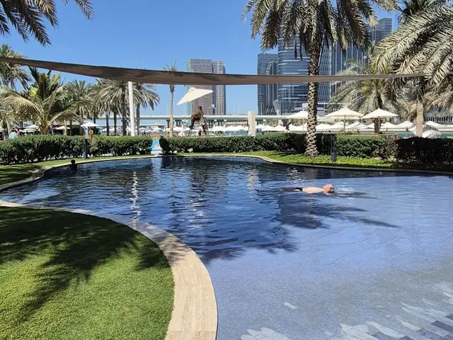 Отель Beach Rotana Abu Dhabi